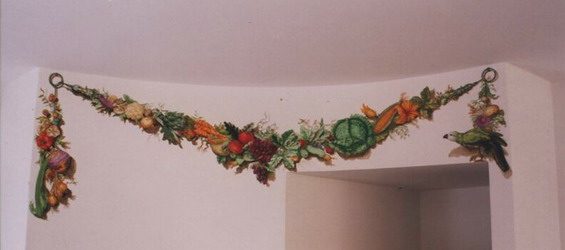 Trompe l'oeil vegetable garland with parrot.